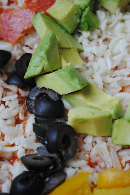 avocada, olives, pepperoni, jicama, peppers pizza