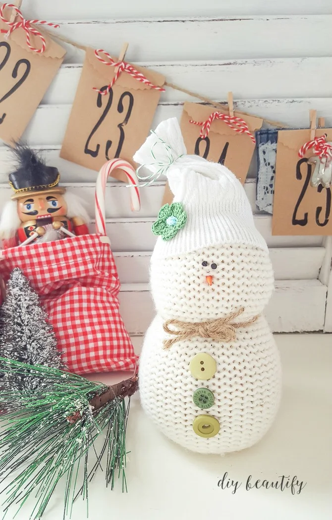 sweater snowman, shutter, advent, gingham bag of toys