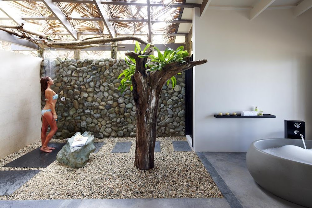 pebbled-with-tree-outdoor-shower-faucets