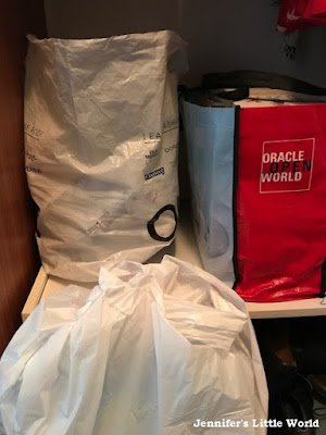Bags of clutter in a wardrobe