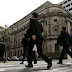 INVESTORS STUCK BETWEEN TWO CENTRAL BANKS / THE WALL STREET JOURNAL