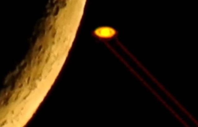 Unknown laser beams being fired from Saturn into deep space!  Laser%2Bbeams%2Benergy%2Bwaves%2BSaturn