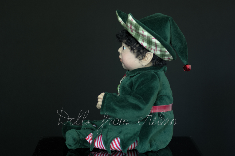 ooak Christmas elf art doll in profile