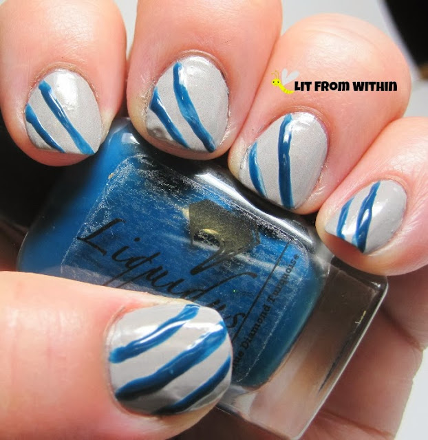 The first set of stripes I did with a nail art brush and Liquidus Blue Diamond Turquoise