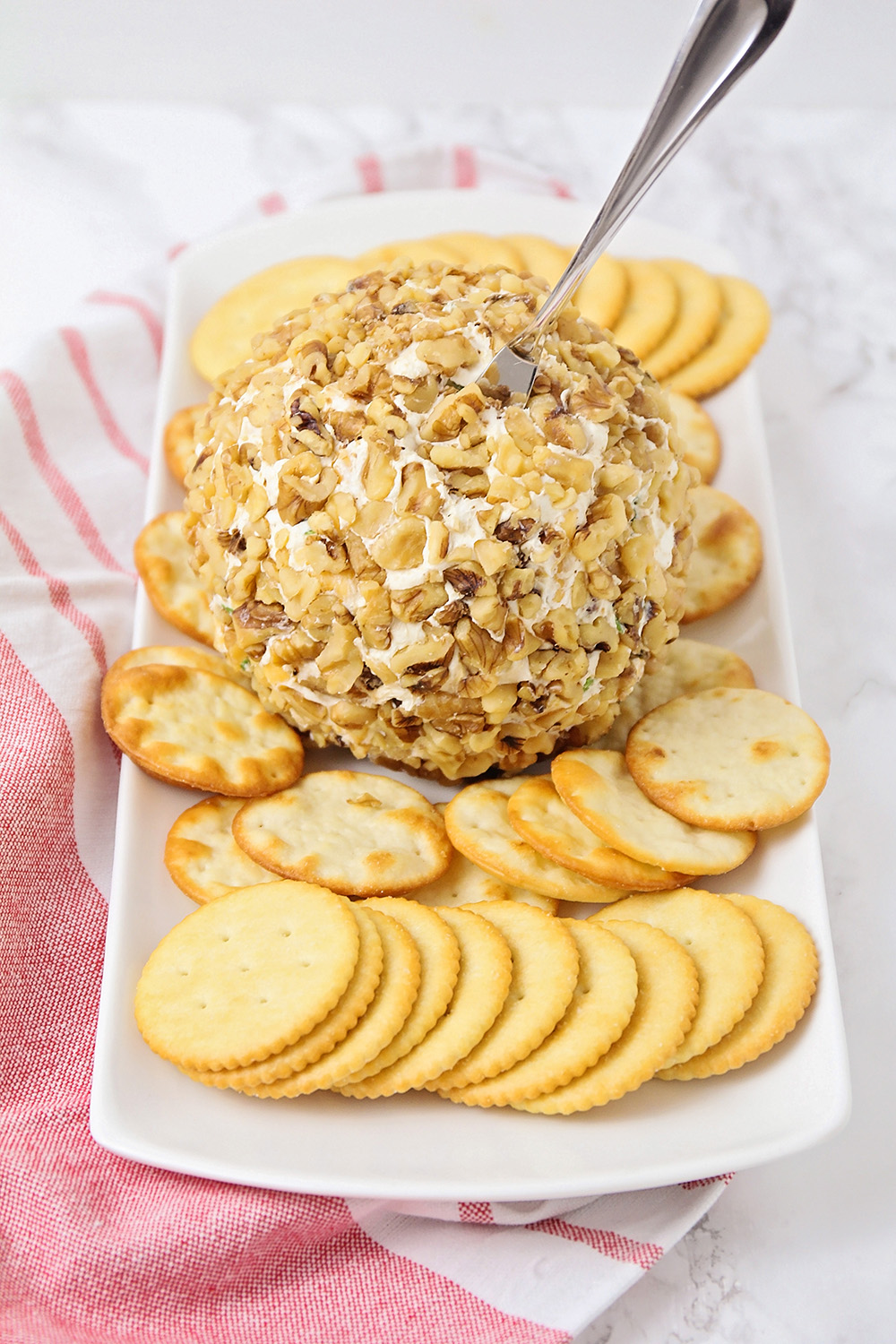This savory and flavorful bacon cheddar cheeseball is so easy to make, and so delicious. It's the perfect party appetizer!