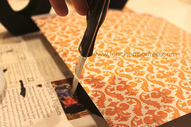 Knife cutting scrapbook paper, from Fun Cheap or Free