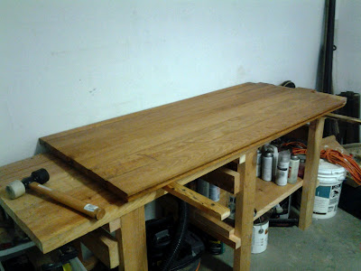 A sharp, functional work bench is quickly constructed from rescued hard yellow pine boards. (easy DIY work table)