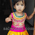 Baby in Yellow Kanchipattu Lehenga