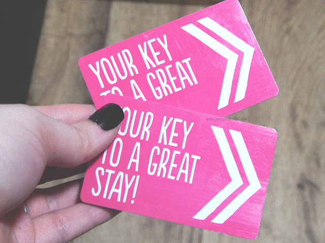 Pink keycards reading your key to a great stay