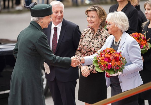 Queen Margrethe, Crown Prince Frederik and Princess Benedikte. Crown Princess Mary wore Claes Iversen coat