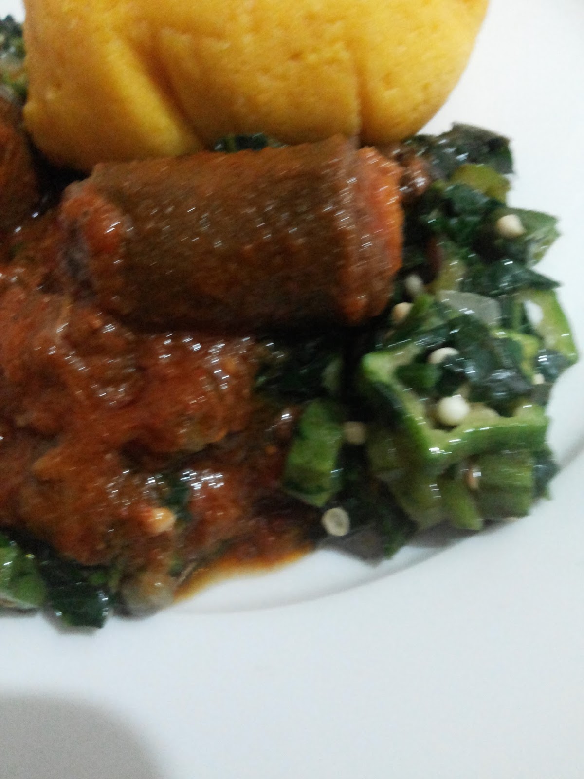 Ugu Okro Soup Served With Stew And Corn Flour Fufu