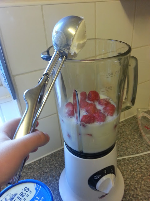 Strawberries and Milk in Blender
