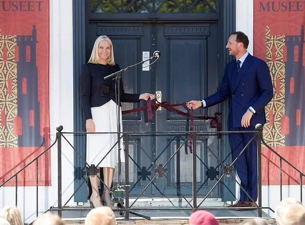 Crown Princess Mette Marit attended opening of an exhibition. Princess Mette Marit wore Prada Jacket and Christian Louboutin Simple Pump