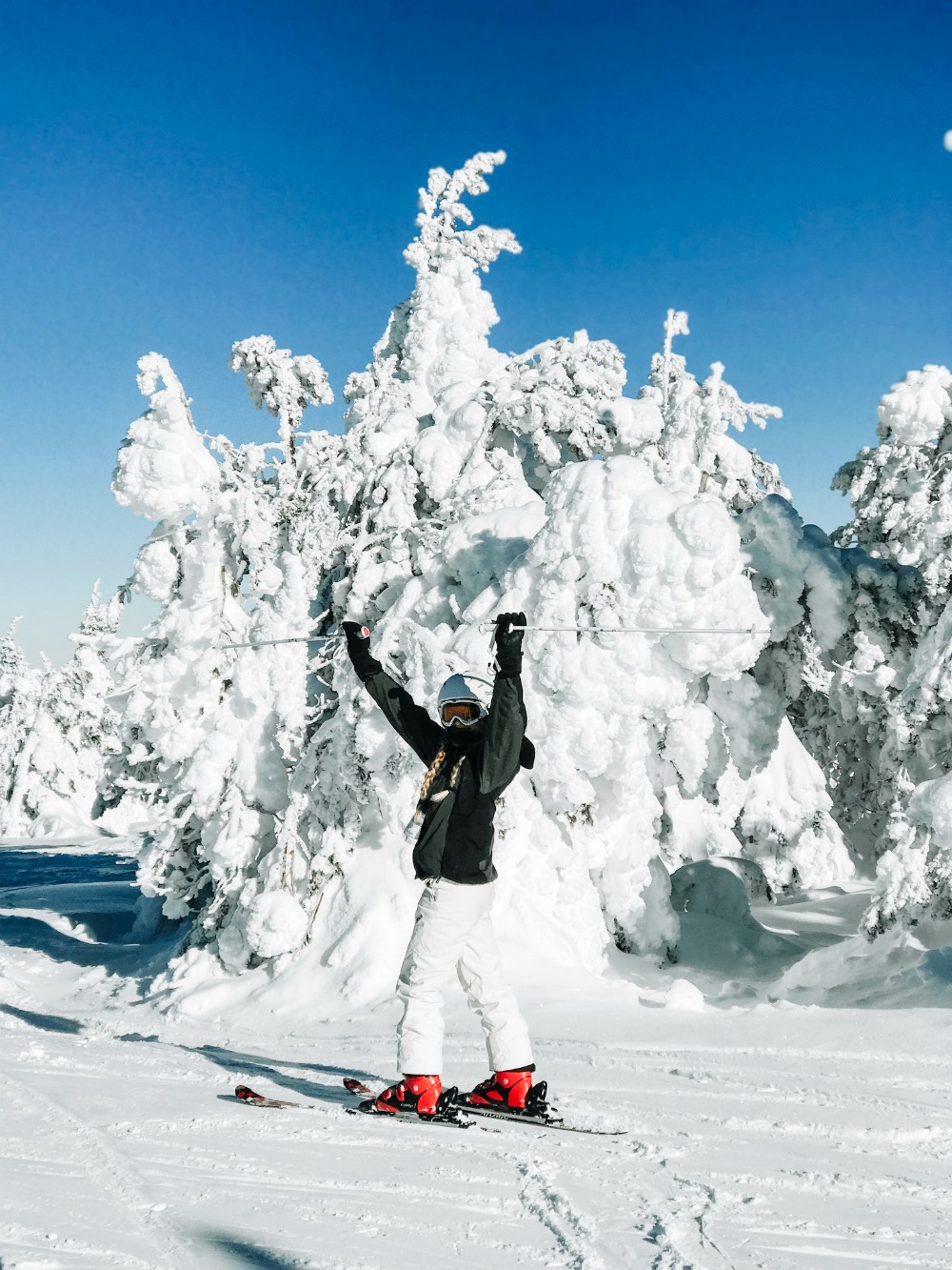teenage girl skiing Mission Ridge with fresh snow 