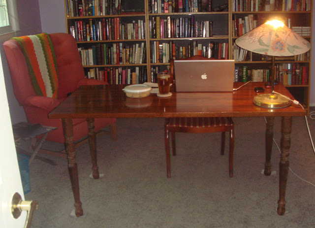 Bookselves on every wall, a glass of iced tea; life is good.