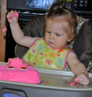 Birthday girl attacks pig cake