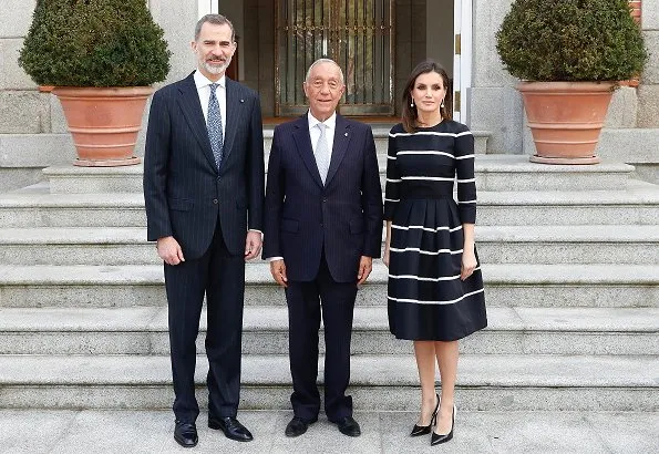 Queen Letizia wore Carolina Herrera striped fit and flare dress. Portuguese president Marcelo Rebelo De Sousa visited Madrid
