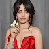 Rosas blancas por la equidad, el símbolo en la alfombra roja de los Grammy