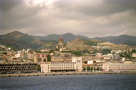 The waterfront at Messina, with the colossal church  of Christ the King dominating the scene
