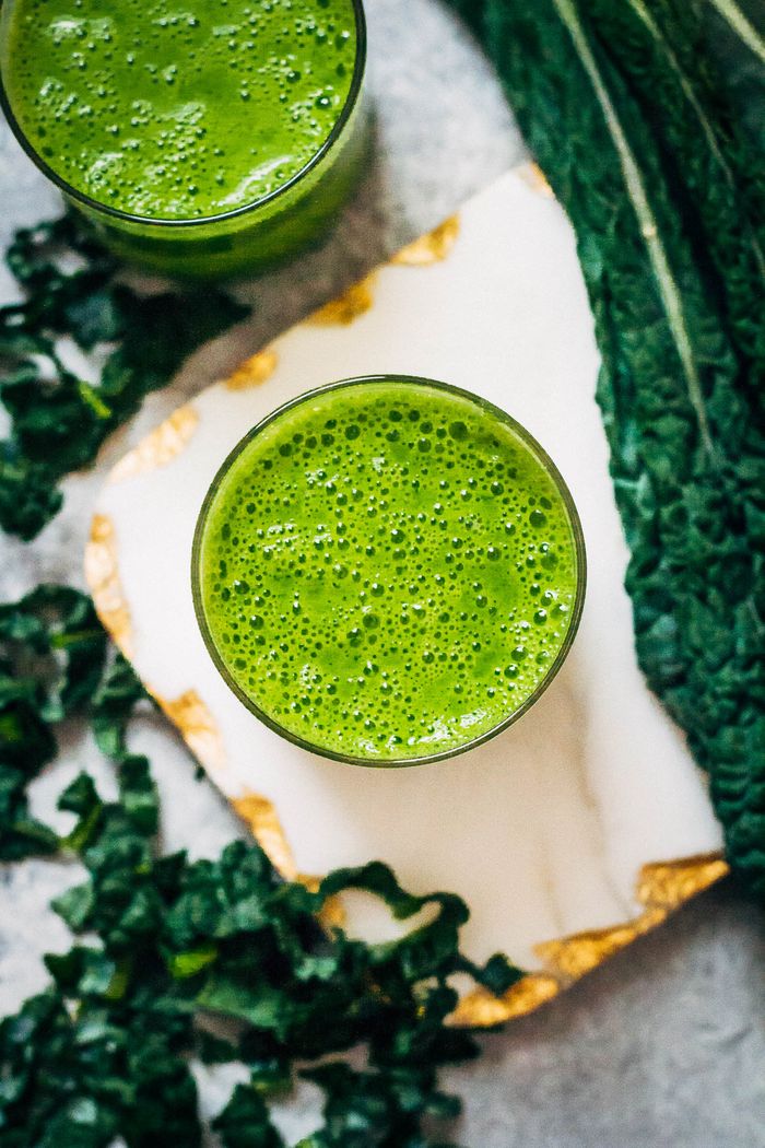 A Kale Pineapple Smoothie. Need more recipes? Check out 15+ List of Vegan Drinks that are Extremely Delicious. vegan detox smoothie | green smoothie vegan raw vegan smoothie | vegan juice recipes | yummy healthy smoothie | breakfast smoothie vegan #vegan #detox #drinks #smoothie #green