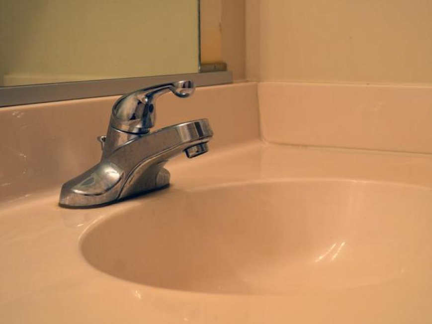need plumber for water drip in bathroom sink