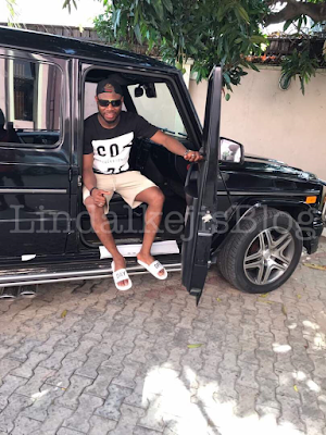 2aa Super Eagles star Sylvester Igboun poses with his new $129,000 G-Wagon to celebrate Democracy day (photos)