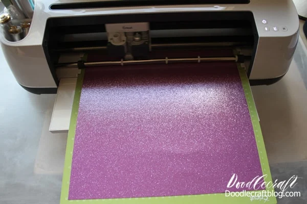 Cricut Maker cutting sparkly glitter cardstock paper to make paper flowers for a letterboard.