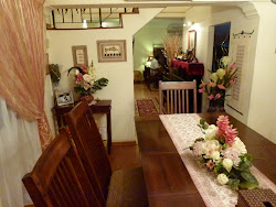 Reena's cosy home.A combination of dried n silk flowers arrangements used.