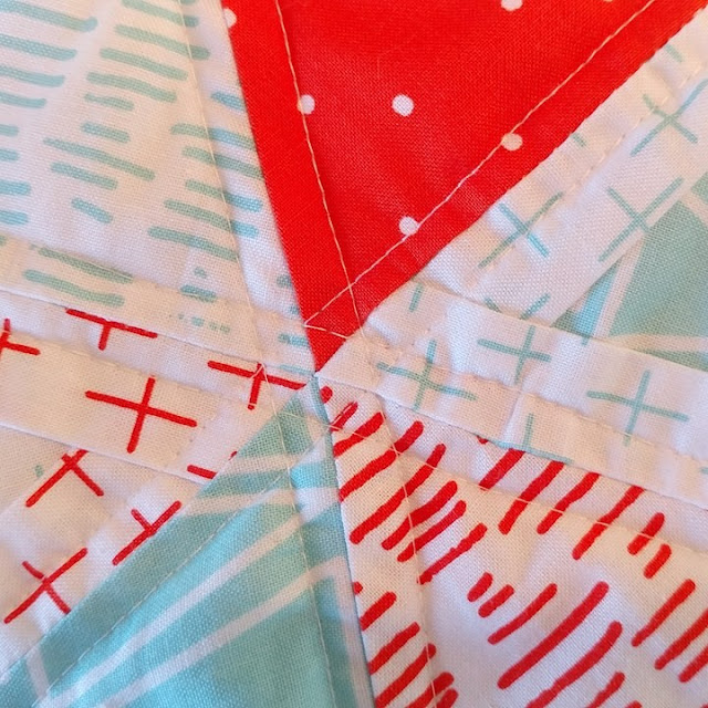 Rough Around the Edges equilateral triangle quilt by Slice of Pi Quilts