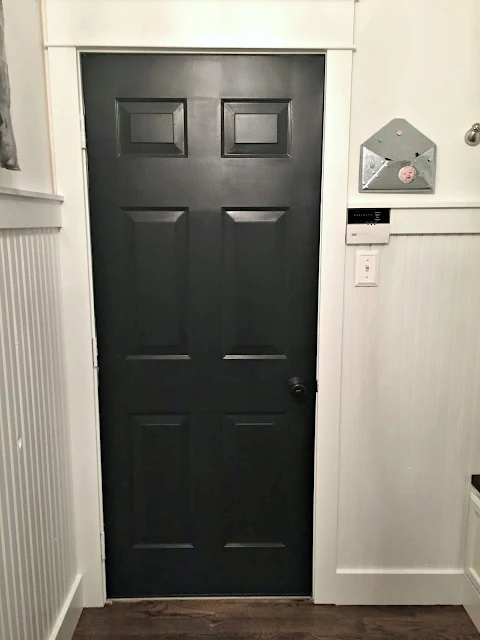 black door white walls