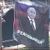 Плакат с Путиным в Нью-Йорке провисел почти час(ФОТО, ВИДЕО)
