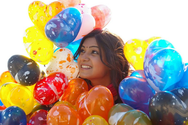 samantha with colorful balloons