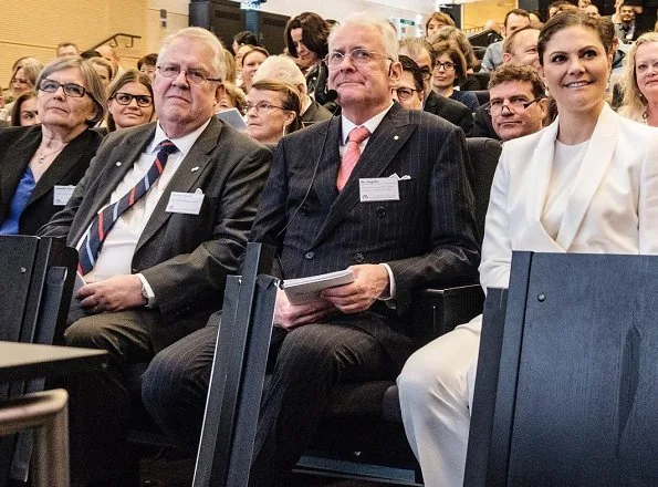 Crown Princess Victoria wore H&M Jacket with Tie Belt and H&M trousers at Tobias Registry's anniversary ceremony at Lund University Stockholm