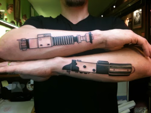 light saber arm tattoo