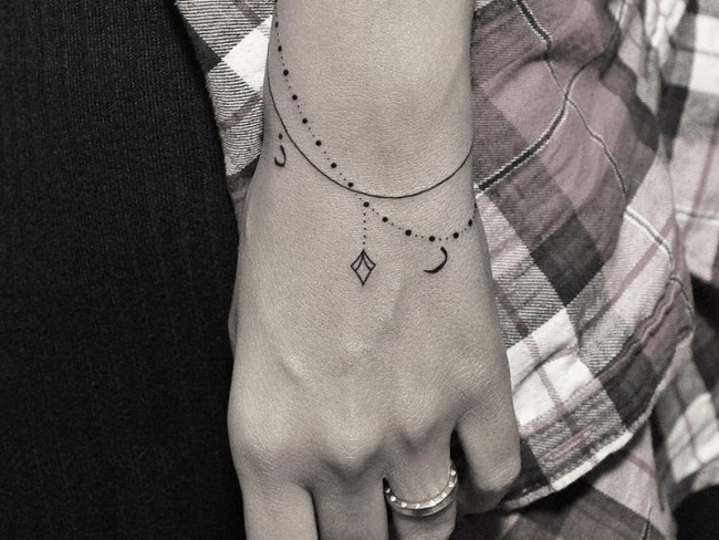 I don't wear bracelets so got this wrist tatoo with all my babiea on it. | Wrist  bracelet tattoo, Wrist tattoos for women, Tattoo bracelet