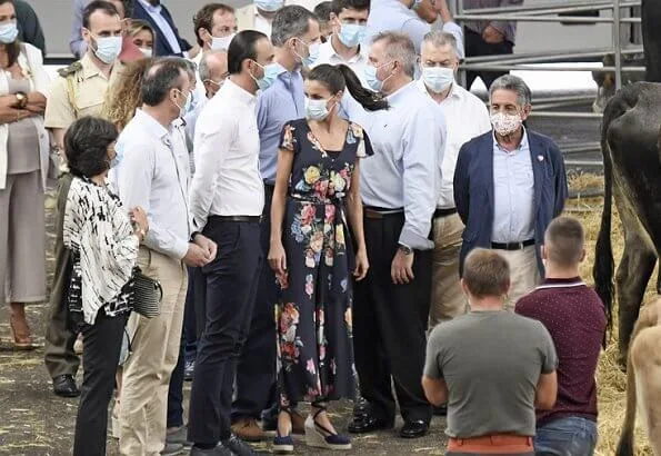 Queen Letizia wore a floral jumpsuit from Uterque, which she had worn before, and espadrille wedges from Macarena