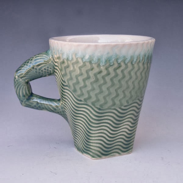 Clay shares Stamped and found textured mugs