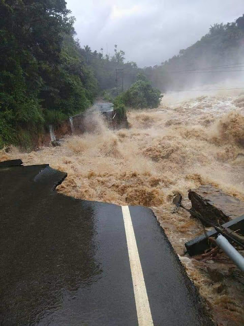 Road washed away by raging flood water, Kerala floods 2018