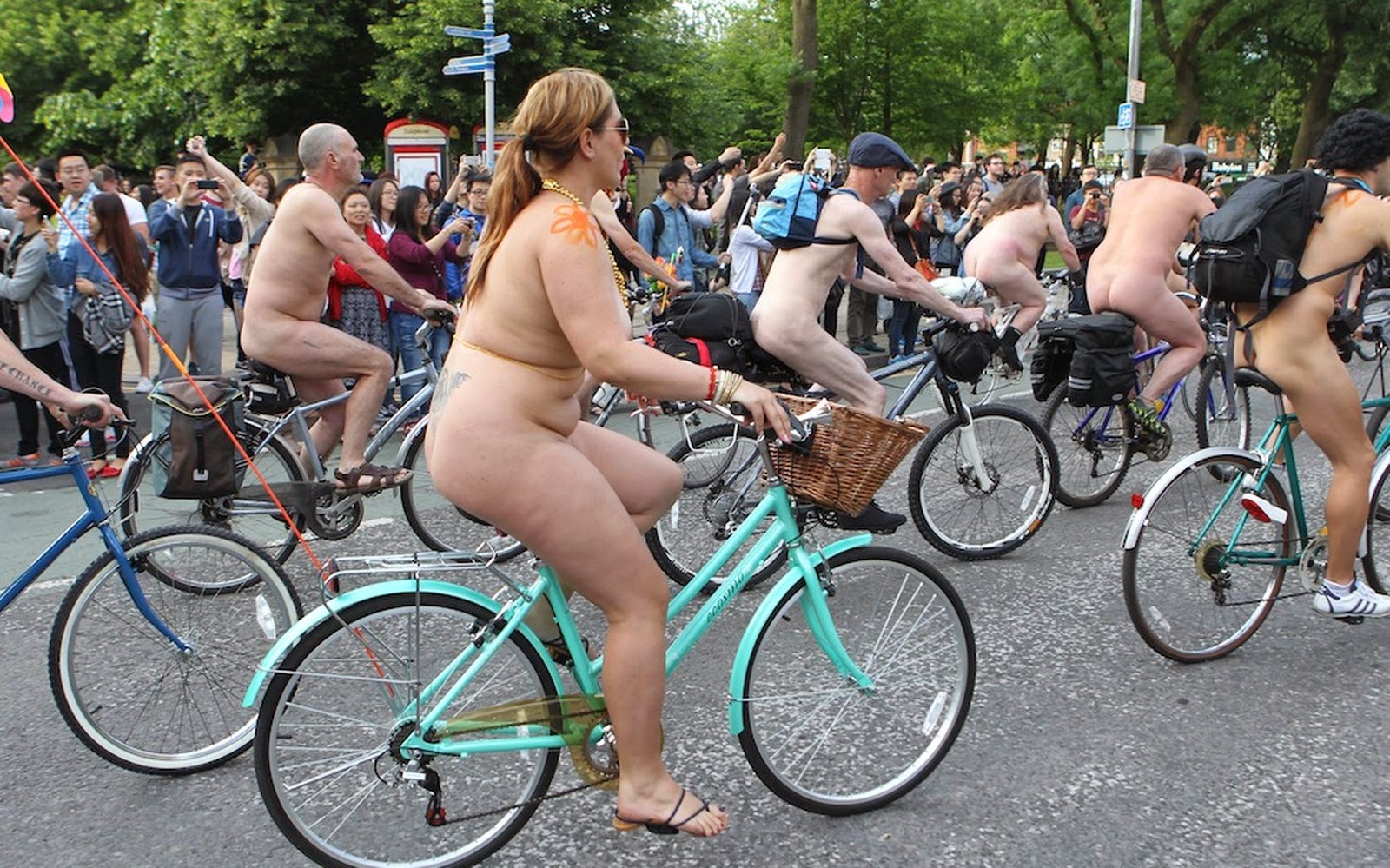 Hundreds of naked bike enthusiasts have swarmed through. in a mass show of ...