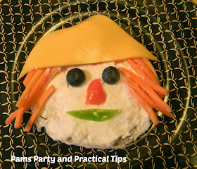 Make a scarecrow face snack out if favorite veggies 