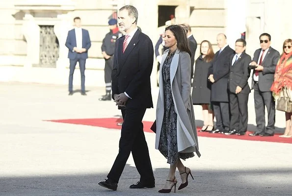 Queen Letizia wore Massimo Dutti snakeskin print dress with tie belt