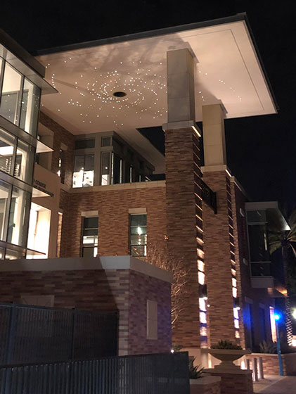 Fancy lighted spiral animation on covered section on new science building at Chapman U. (Source: Palmia Observatory)