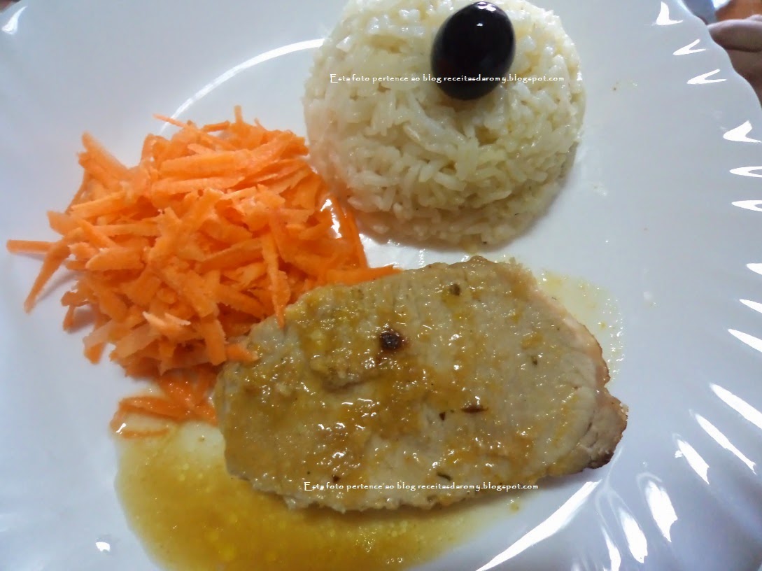 Carne de porco com molho de laranja