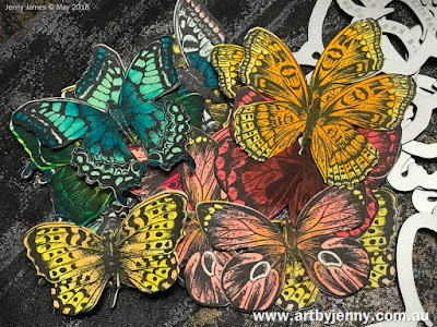 butterflies art journal page using stamps and other mixed media craft supplies