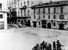 Rioters mounted barricades when troops were sent to quell the food riots in Milan in the late 1890s