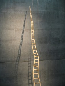 long crooked ladder that gets smaller as it goes higher