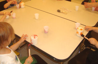 Painting Paschal Candles in a Group