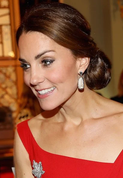 Kate Middleton wore Preen Finella Satin Midi Dres, Baroque Pearl Double Sided Earrings by Soru Jewellery,  Jenny Packham 'Casa' clutch, Gianvito Rossi pumps