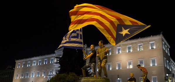 Athens 15-06-29: Greek & Catalonian 'Estelada' flags flying.