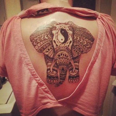elephant tattoo idea on the back
